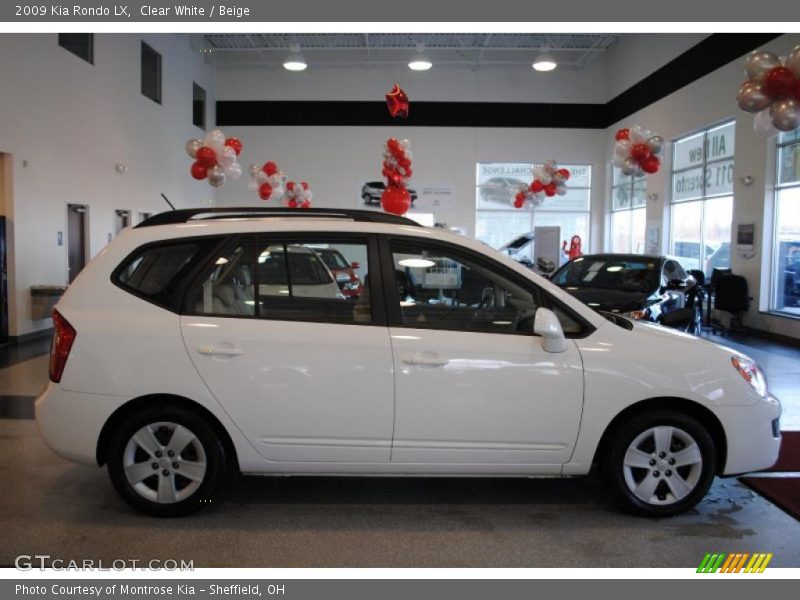 Clear White / Beige 2009 Kia Rondo LX