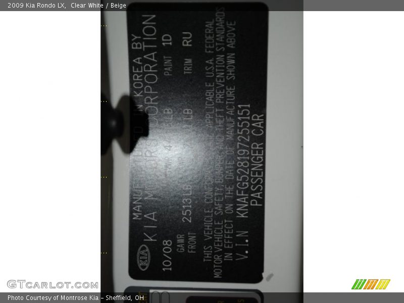 Clear White / Beige 2009 Kia Rondo LX