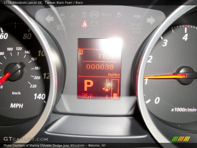 Tarmac Black Pearl / Black 2010 Mitsubishi Lancer DE