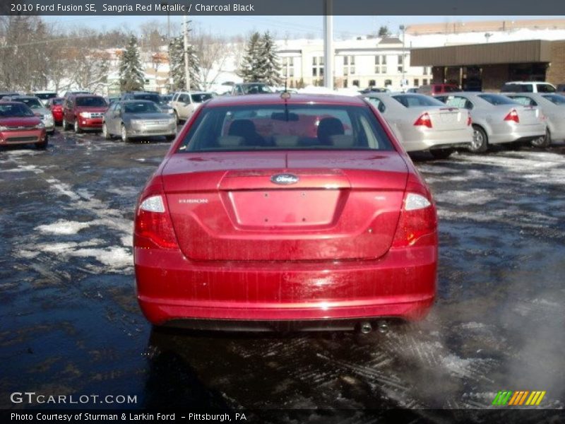 Sangria Red Metallic / Charcoal Black 2010 Ford Fusion SE