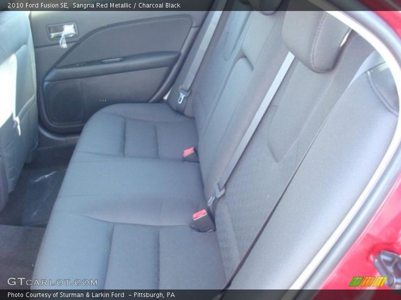 Sangria Red Metallic / Charcoal Black 2010 Ford Fusion SE