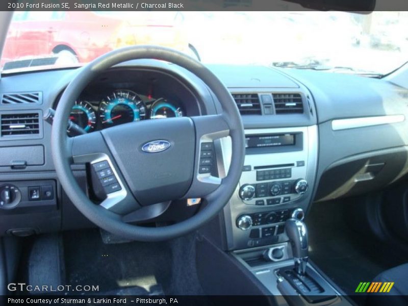 Sangria Red Metallic / Charcoal Black 2010 Ford Fusion SE