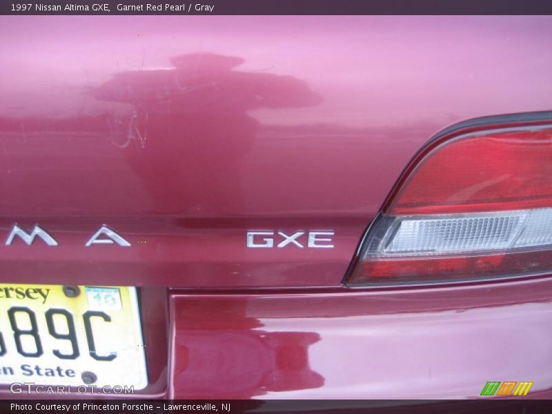 Garnet Red Pearl / Gray 1997 Nissan Altima GXE