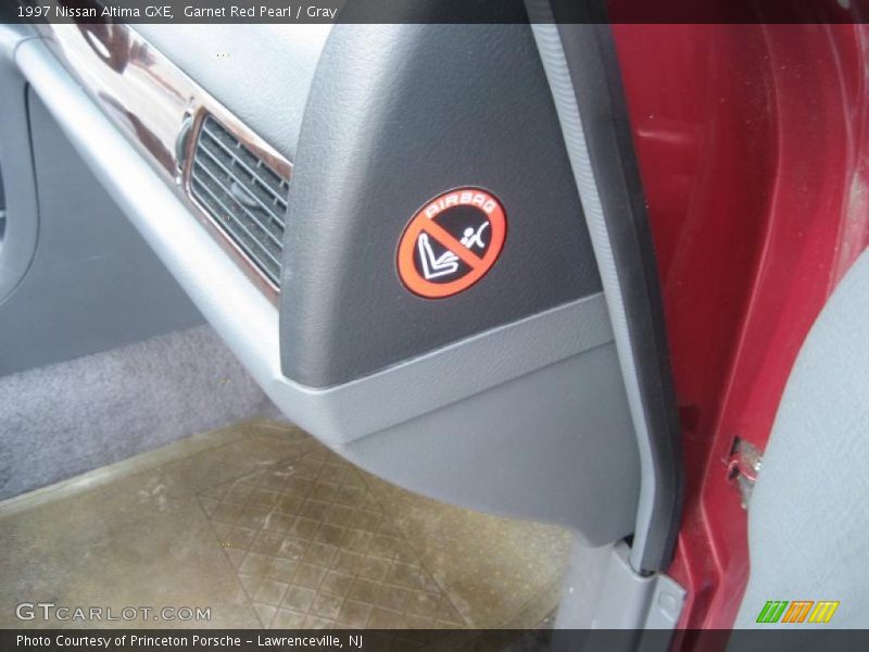 Garnet Red Pearl / Gray 1997 Nissan Altima GXE