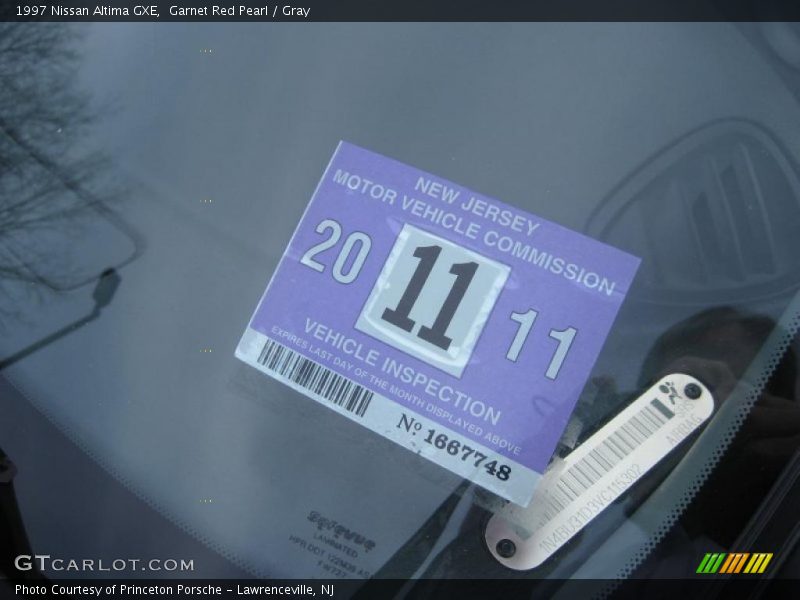 Garnet Red Pearl / Gray 1997 Nissan Altima GXE