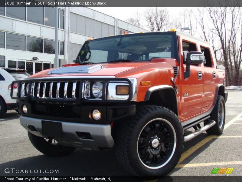 Solar Flare Metallic / Ebony Black 2008 Hummer H2 SUT