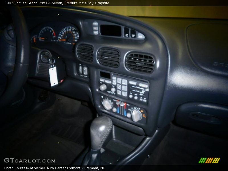 Redfire Metallic / Graphite 2002 Pontiac Grand Prix GT Sedan