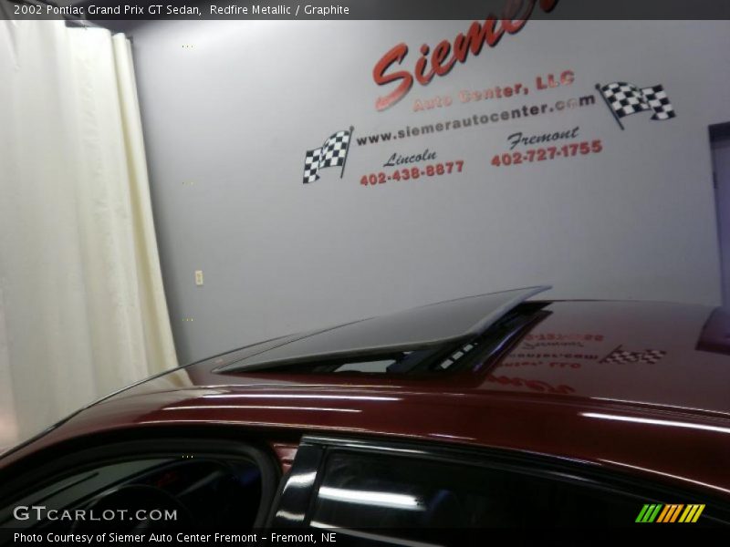Redfire Metallic / Graphite 2002 Pontiac Grand Prix GT Sedan