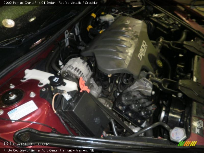 Redfire Metallic / Graphite 2002 Pontiac Grand Prix GT Sedan