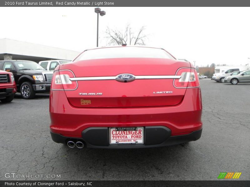Red Candy Metallic / Light Stone 2010 Ford Taurus Limited