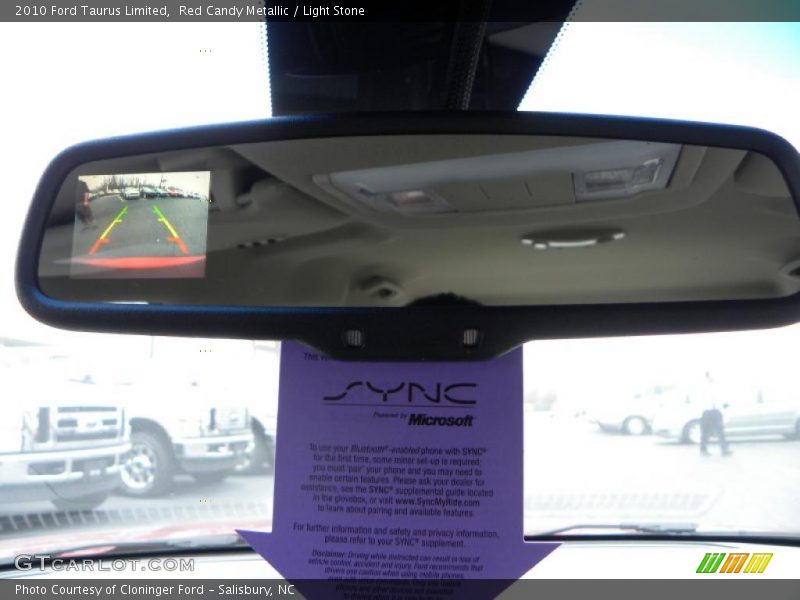 Red Candy Metallic / Light Stone 2010 Ford Taurus Limited