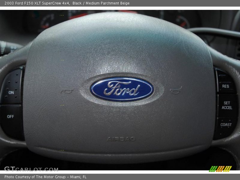 Black / Medium Parchment Beige 2003 Ford F150 XLT SuperCrew 4x4