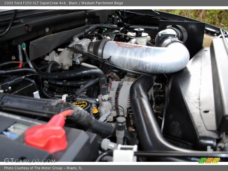 Black / Medium Parchment Beige 2003 Ford F150 XLT SuperCrew 4x4