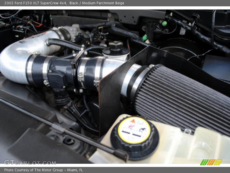 Black / Medium Parchment Beige 2003 Ford F150 XLT SuperCrew 4x4