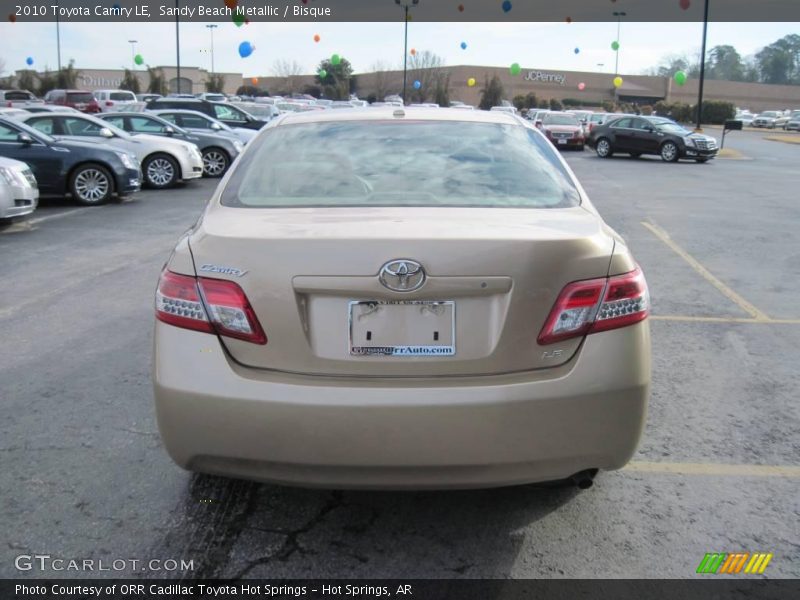 Sandy Beach Metallic / Bisque 2010 Toyota Camry LE