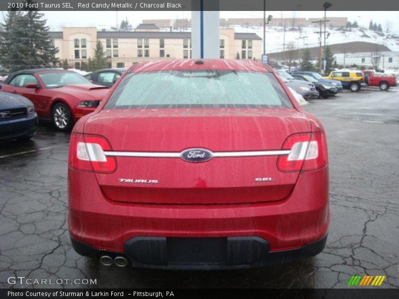 Red Candy Metallic / Charcoal Black 2010 Ford Taurus SEL