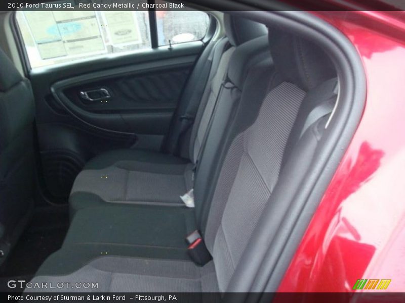 Red Candy Metallic / Charcoal Black 2010 Ford Taurus SEL