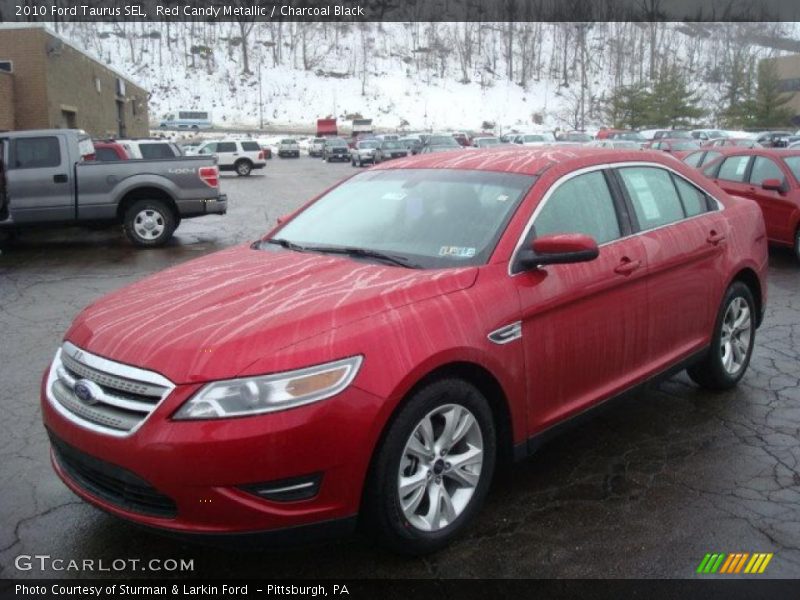 Red Candy Metallic / Charcoal Black 2010 Ford Taurus SEL