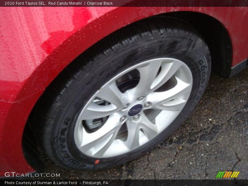 Red Candy Metallic / Charcoal Black 2010 Ford Taurus SEL