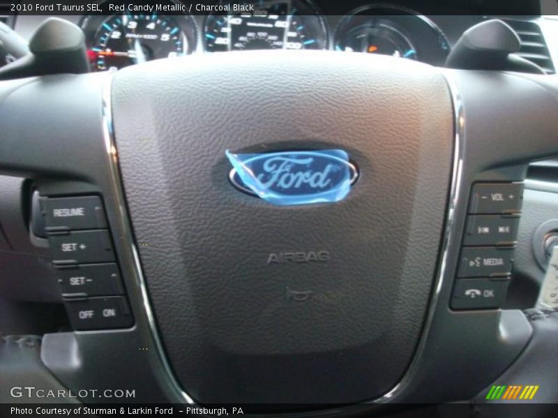 Red Candy Metallic / Charcoal Black 2010 Ford Taurus SEL
