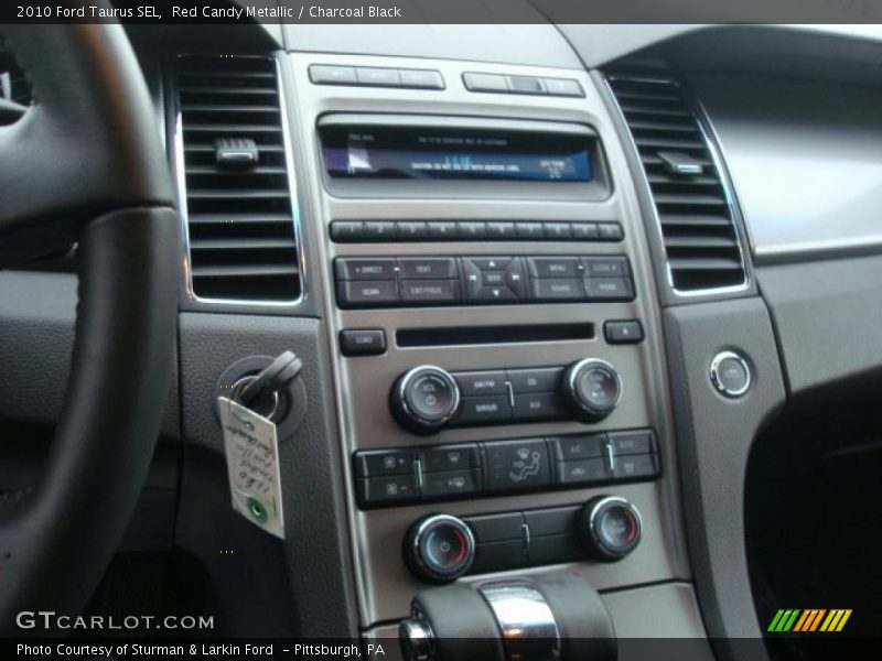 Red Candy Metallic / Charcoal Black 2010 Ford Taurus SEL