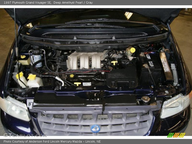 Deep Amethyst Pearl / Gray 1997 Plymouth Grand Voyager SE