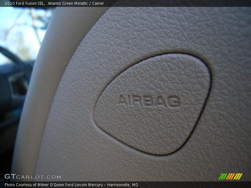 Atlantis Green Metallic / Camel 2010 Ford Fusion SEL
