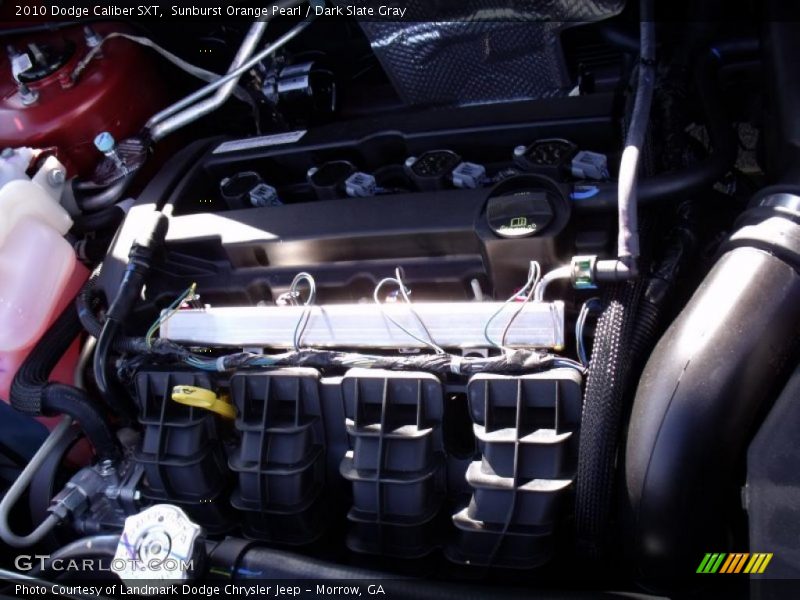 Sunburst Orange Pearl / Dark Slate Gray 2010 Dodge Caliber SXT