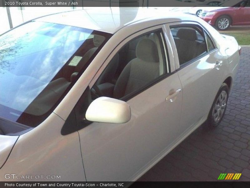 Super White / Ash 2010 Toyota Corolla
