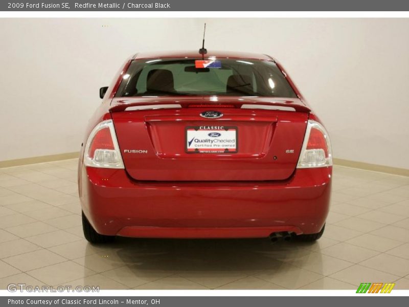 Redfire Metallic / Charcoal Black 2009 Ford Fusion SE