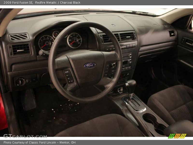 Redfire Metallic / Charcoal Black 2009 Ford Fusion SE