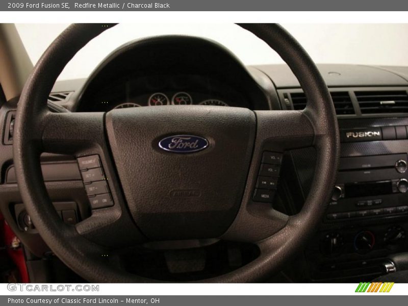 Redfire Metallic / Charcoal Black 2009 Ford Fusion SE