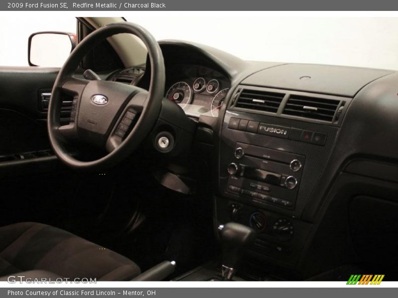 Redfire Metallic / Charcoal Black 2009 Ford Fusion SE
