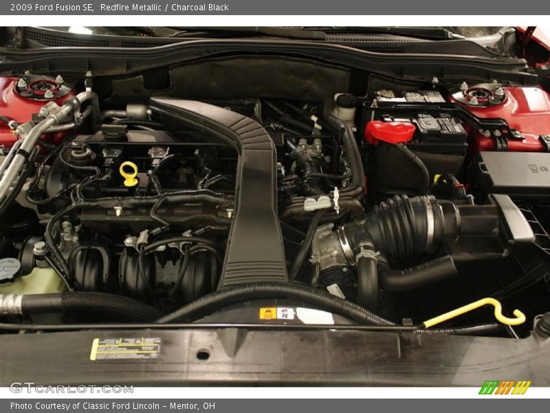 Redfire Metallic / Charcoal Black 2009 Ford Fusion SE