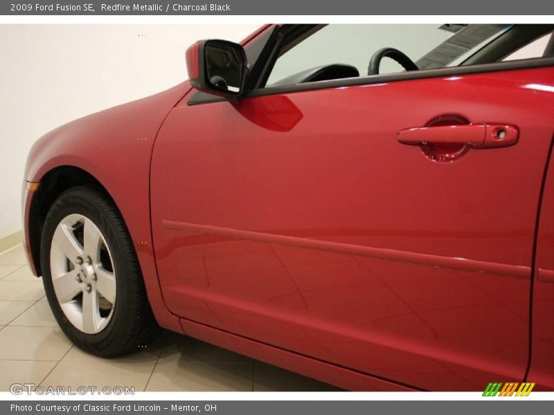 Redfire Metallic / Charcoal Black 2009 Ford Fusion SE
