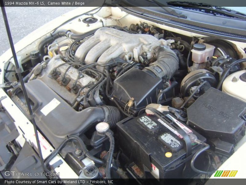 Cameo White / Beige 1994 Mazda MX-6 LS