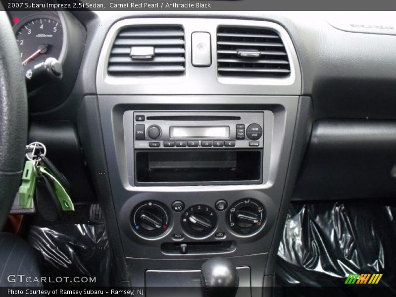 Garnet Red Pearl / Anthracite Black 2007 Subaru Impreza 2.5i Sedan