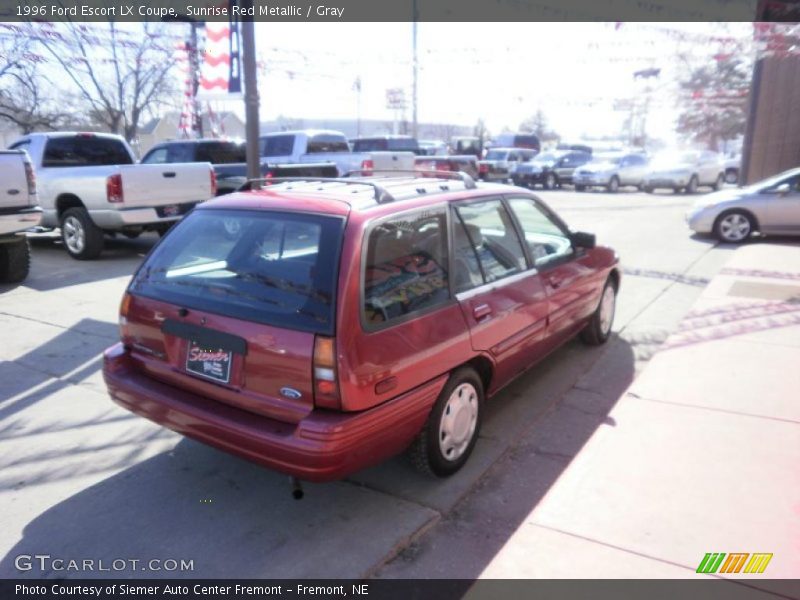 Sunrise Red Metallic / Gray 1996 Ford Escort LX Coupe