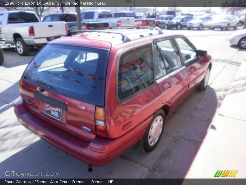 Sunrise Red Metallic / Gray 1996 Ford Escort LX Coupe