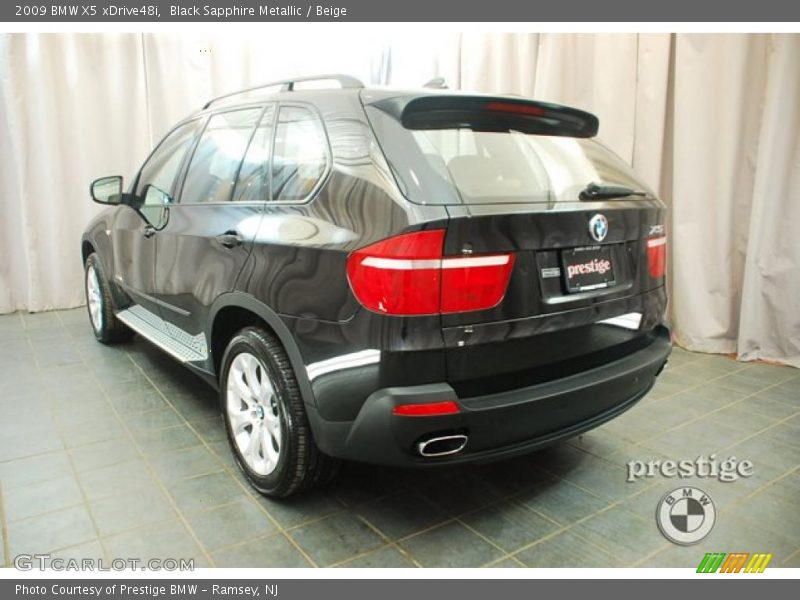Black Sapphire Metallic / Beige 2009 BMW X5 xDrive48i