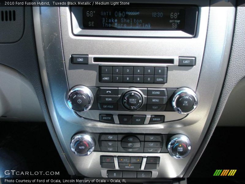 Tuxedo Black Metallic / Medium Light Stone 2010 Ford Fusion Hybrid