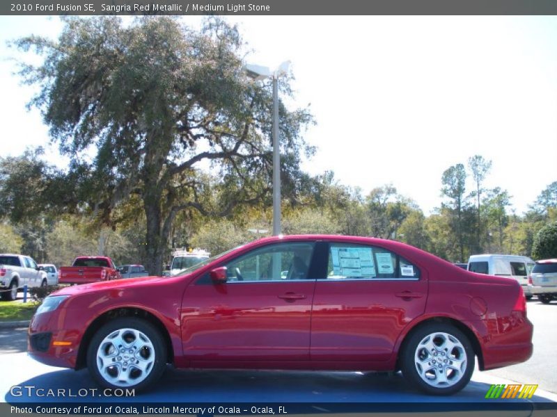 Sangria Red Metallic / Medium Light Stone 2010 Ford Fusion SE