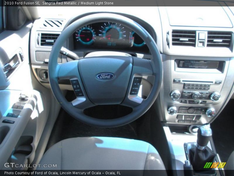 Sangria Red Metallic / Medium Light Stone 2010 Ford Fusion SE