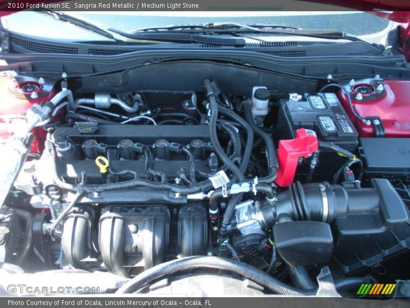 Sangria Red Metallic / Medium Light Stone 2010 Ford Fusion SE