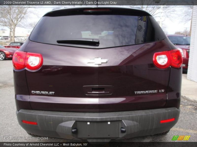 Dark Cherry Metallic / Dark Gray/Light Gray 2009 Chevrolet Traverse LS AWD