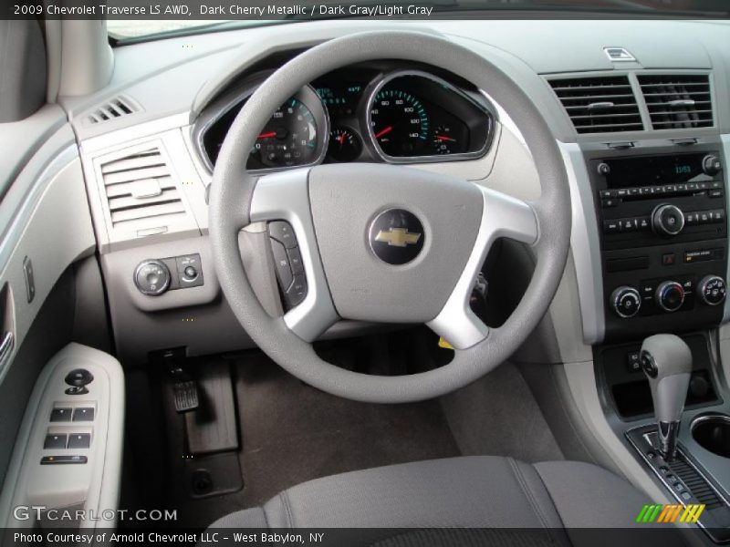 Dark Cherry Metallic / Dark Gray/Light Gray 2009 Chevrolet Traverse LS AWD