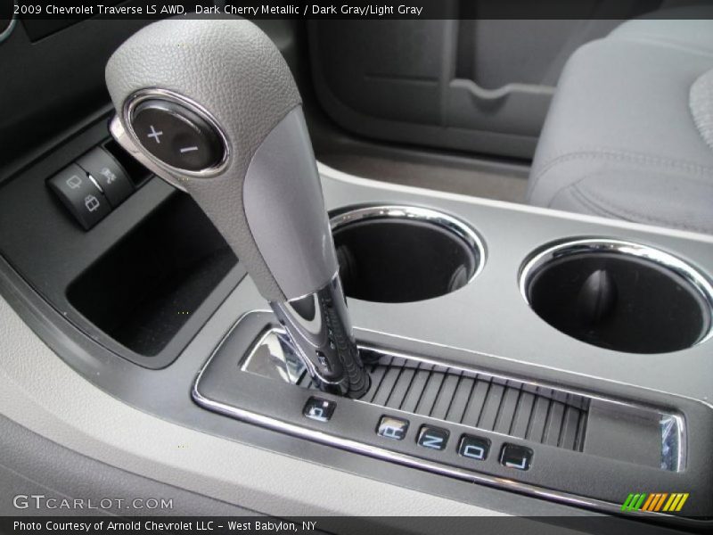 Dark Cherry Metallic / Dark Gray/Light Gray 2009 Chevrolet Traverse LS AWD