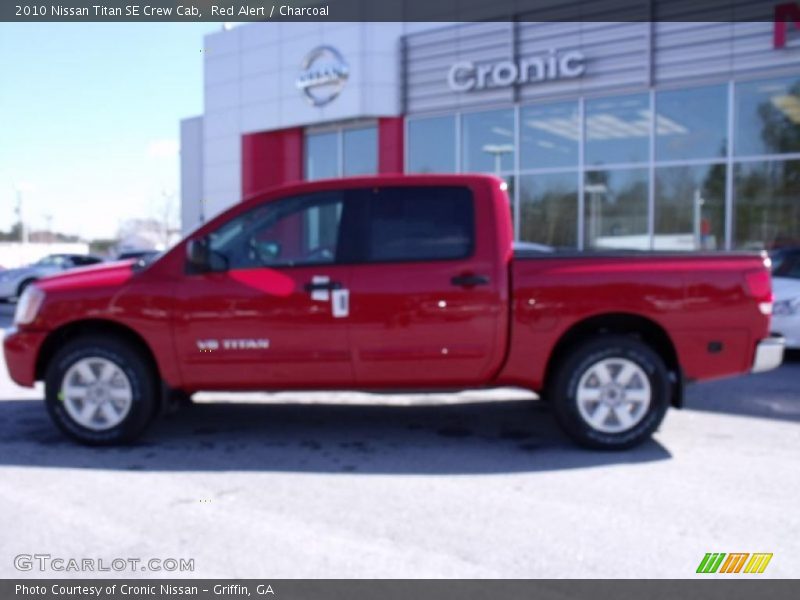 Red Alert / Charcoal 2010 Nissan Titan SE Crew Cab