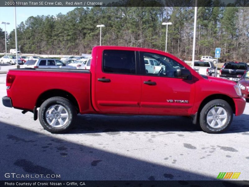 Red Alert / Charcoal 2010 Nissan Titan SE Crew Cab