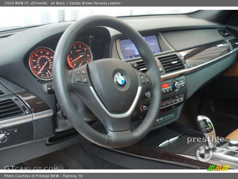 Jet Black / Saddle Brown Nevada Leather 2009 BMW X5 xDrive48i